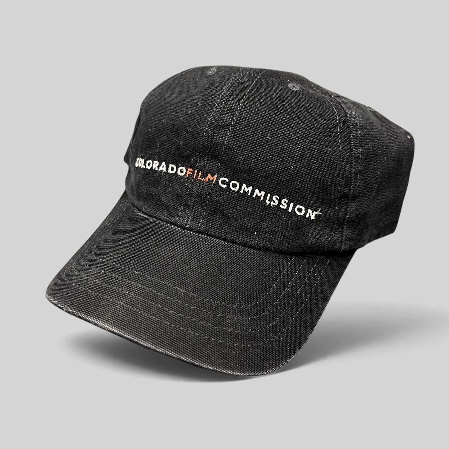 Raree Finds black cotton Colorado Film Commission strapback hat with embroidered logo and red M accent