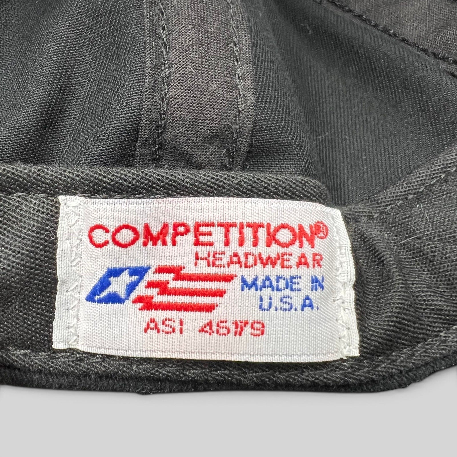 Raree Finds Competition Headwear tag inside a vintage snapback hat, showing Made in U.S.A. text and logo.