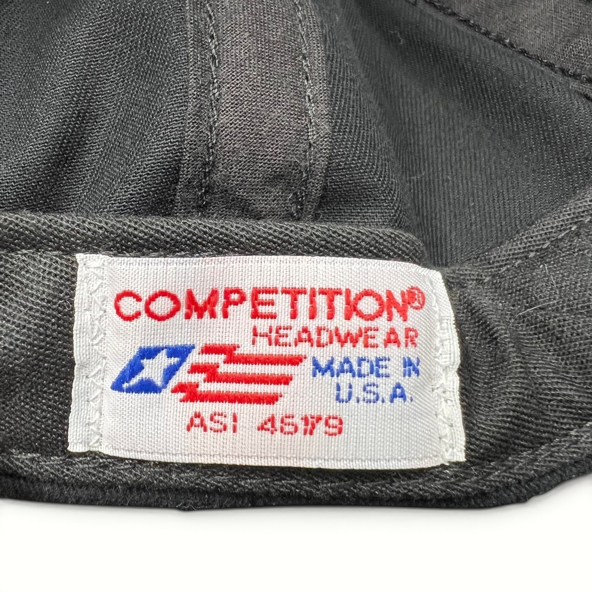 Raree Finds Competition Headwear tag inside a vintage snapback hat, showing Made in U.S.A. text and logo.