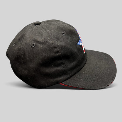 Raree Finds Corps Classics black strapback hat with patriotic American flag star embroidery and red sandwich brim.