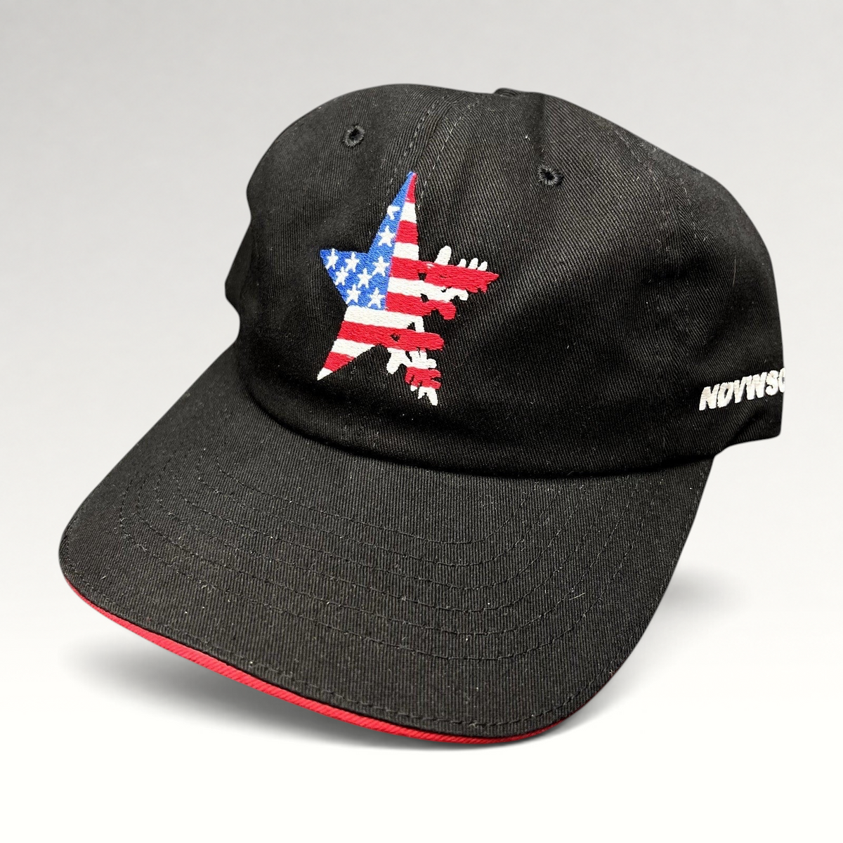 Raree Finds Corps Classics black strapback hat with American flag star embroidery and red sandwich brim detail
