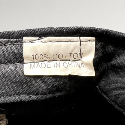 Raree Finds vintage hat interior tag showing 100% cotton material and made in China label on black fabric