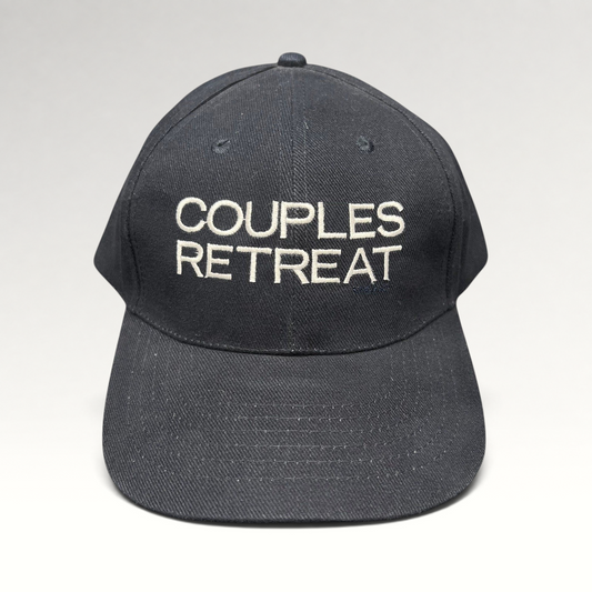 Raree Finds navy cotton strapback hat with white Couples Retreat film embroidery and adjustable brass clasp closure.