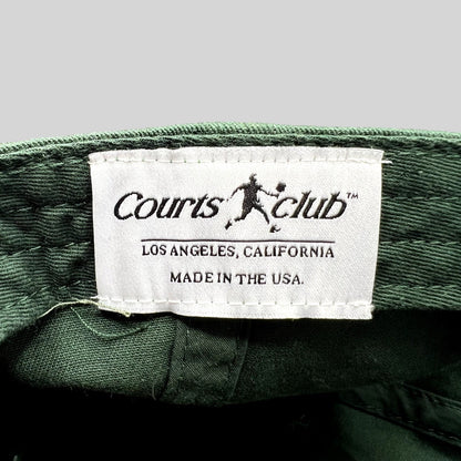 Raree Finds Courts Club Los Angeles hat interior label showing brand name and Made in the USA text on green fabric