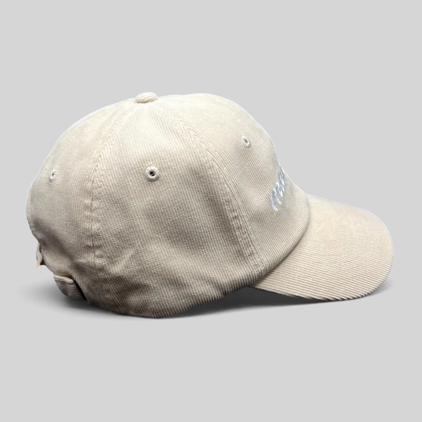 Raree Finds cream corduroy strapback hat with Mamacita embroidery in a minimalist low-profile streetwear style.