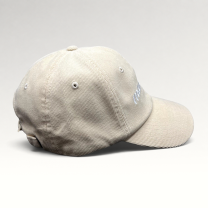 Raree Finds cream corduroy strapback hat with Mamacita embroidery in a minimalist low-profile streetwear style.