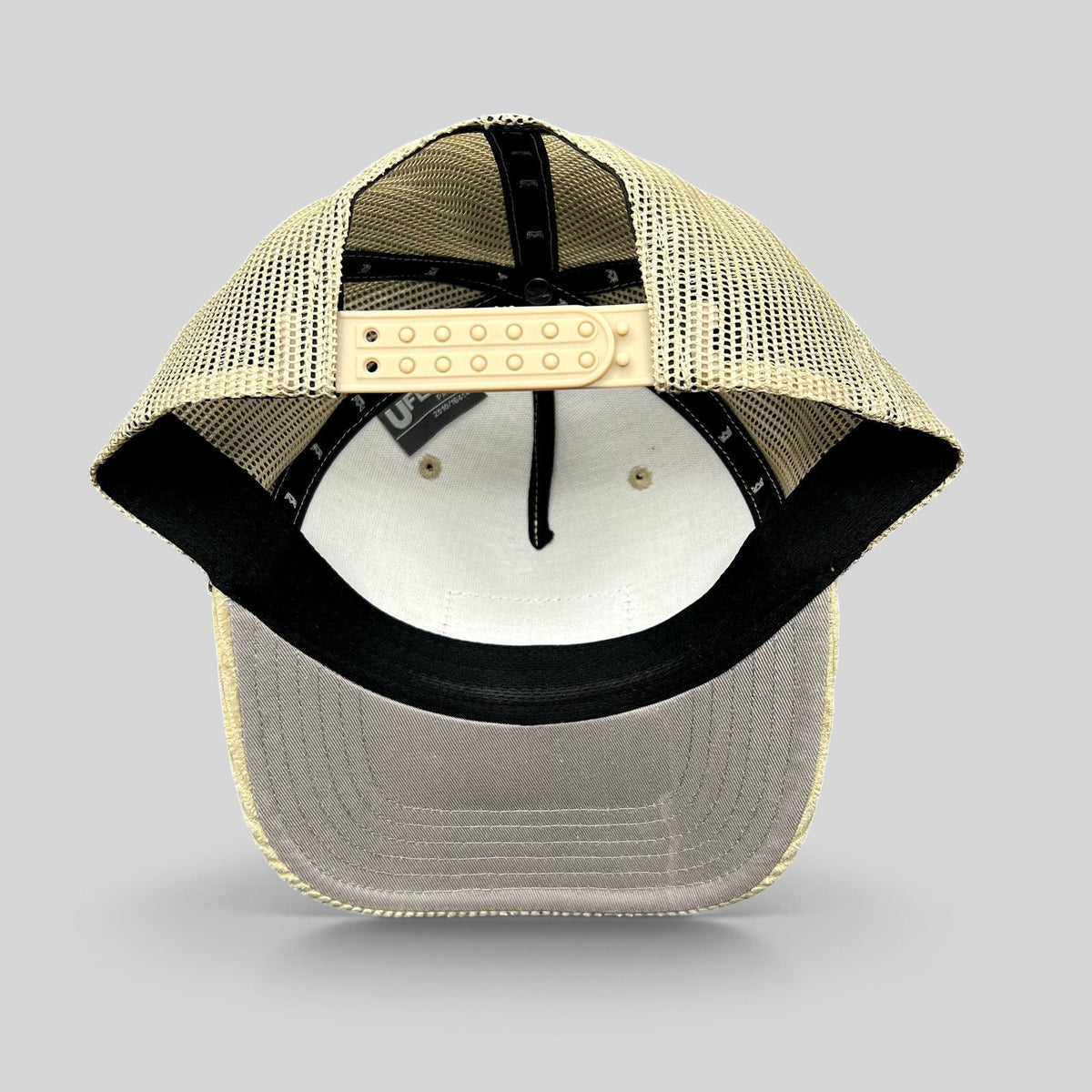 Raree Finds Mabula Game Lodge cream corduroy trucker hat with breathable mesh back and adjustable snapback closure