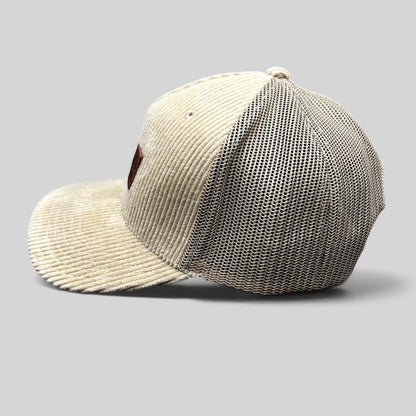 Raree Finds Mabula Game Lodge cream corduroy trucker hat with breathable mesh back and leather patch side view