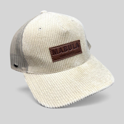 Raree Finds cream corduroy trucker hat with breathable mesh back and embossed leather Mabula Game Lodge patch
