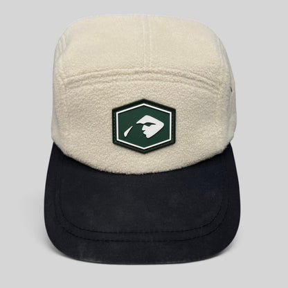 Raree Finds Baldface cream fleece strapback hat with a black bill and green rubber logo patch on the front