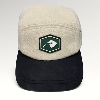 Raree Finds Baldface cream fleece strapback hat with a black bill and green rubber logo patch on the front