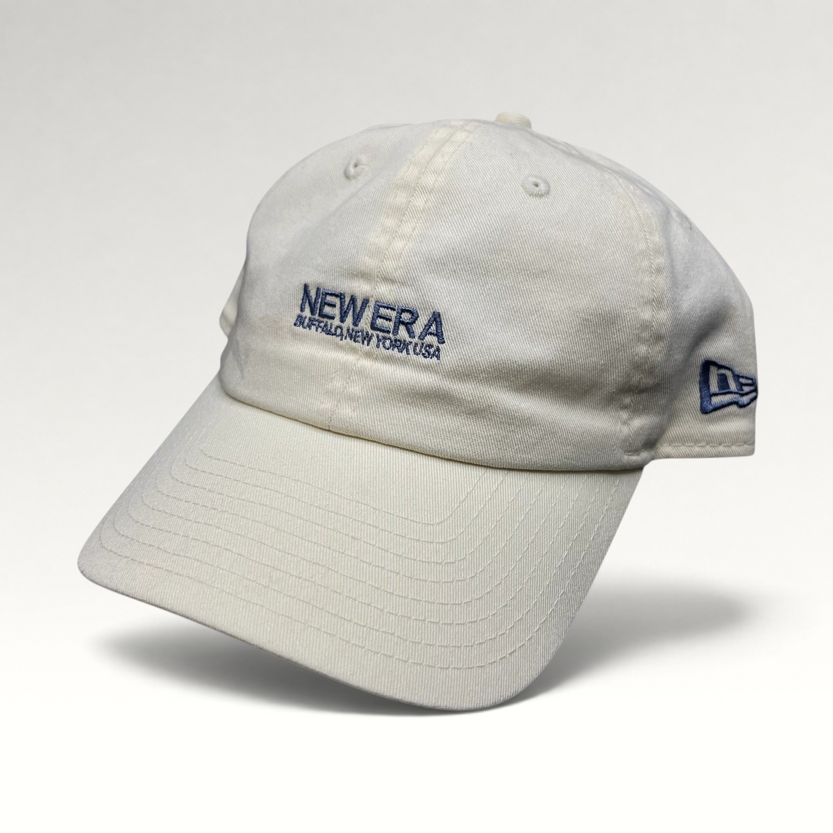 Raree Finds cream 100% cotton New Era strapback hat with embroidered Buffalo New York USA logo and curved brim