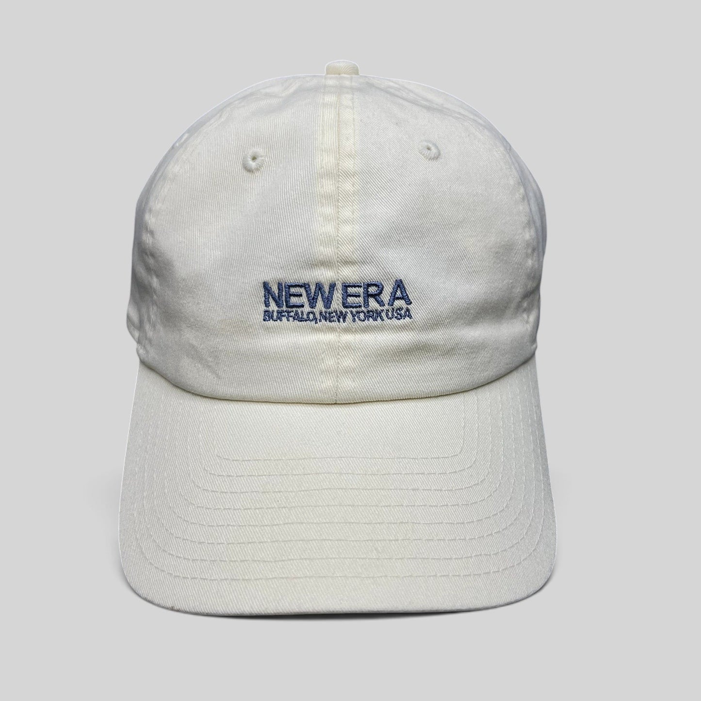 Raree Finds cream New Era cotton strapback hat with embroidered Buffalo New York USA logo and curved brim