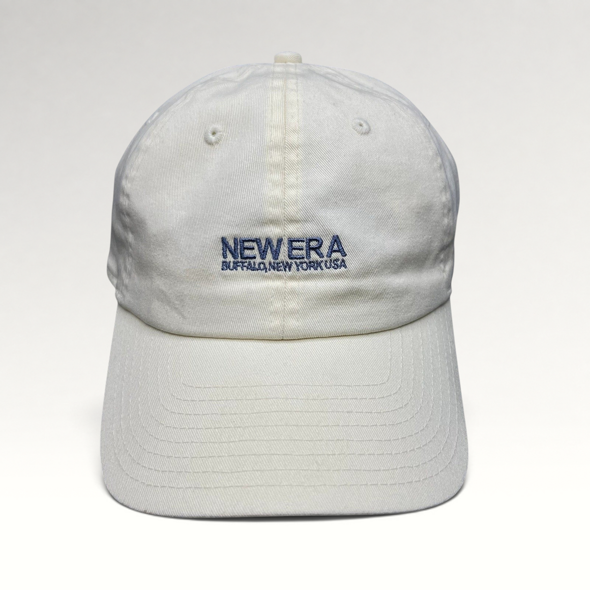 Raree Finds cream New Era cotton strapback hat with embroidered Buffalo New York USA logo and curved brim