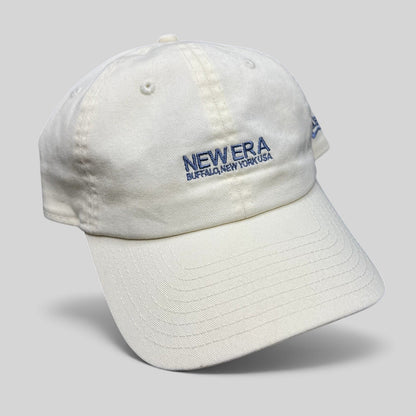 Raree Finds cream New Era cotton strapback hat with embroidered Buffalo New York USA logo and relaxed curved brim