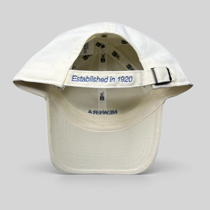 Raree Finds cream cotton New Era strapback hat with Established in 1920 embroidery on the rear adjustable strap