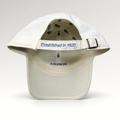 Raree Finds cream cotton New Era strapback hat with Established in 1920 embroidery on the rear adjustable strap