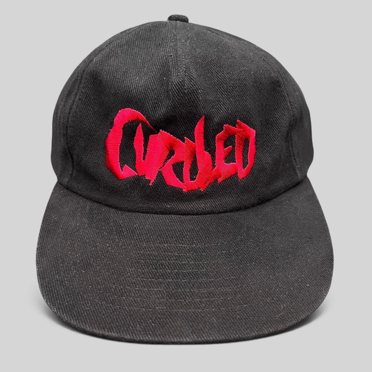Raree Finds black cotton snapback hat with red embroidered Curdled metal band logo on the front panel