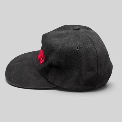 Raree Finds black cotton snapback hat with red embroidered Curdled metal band logo on the front panel.