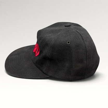 Raree Finds black cotton snapback hat with red embroidered Curdled metal band logo on the front panel.