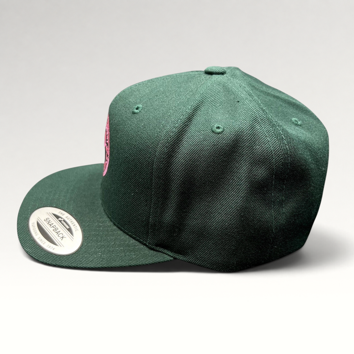 Raree Finds Penny Pound Ice dark green snapback hat with pink In Ice We Trust embroidery and structured crown