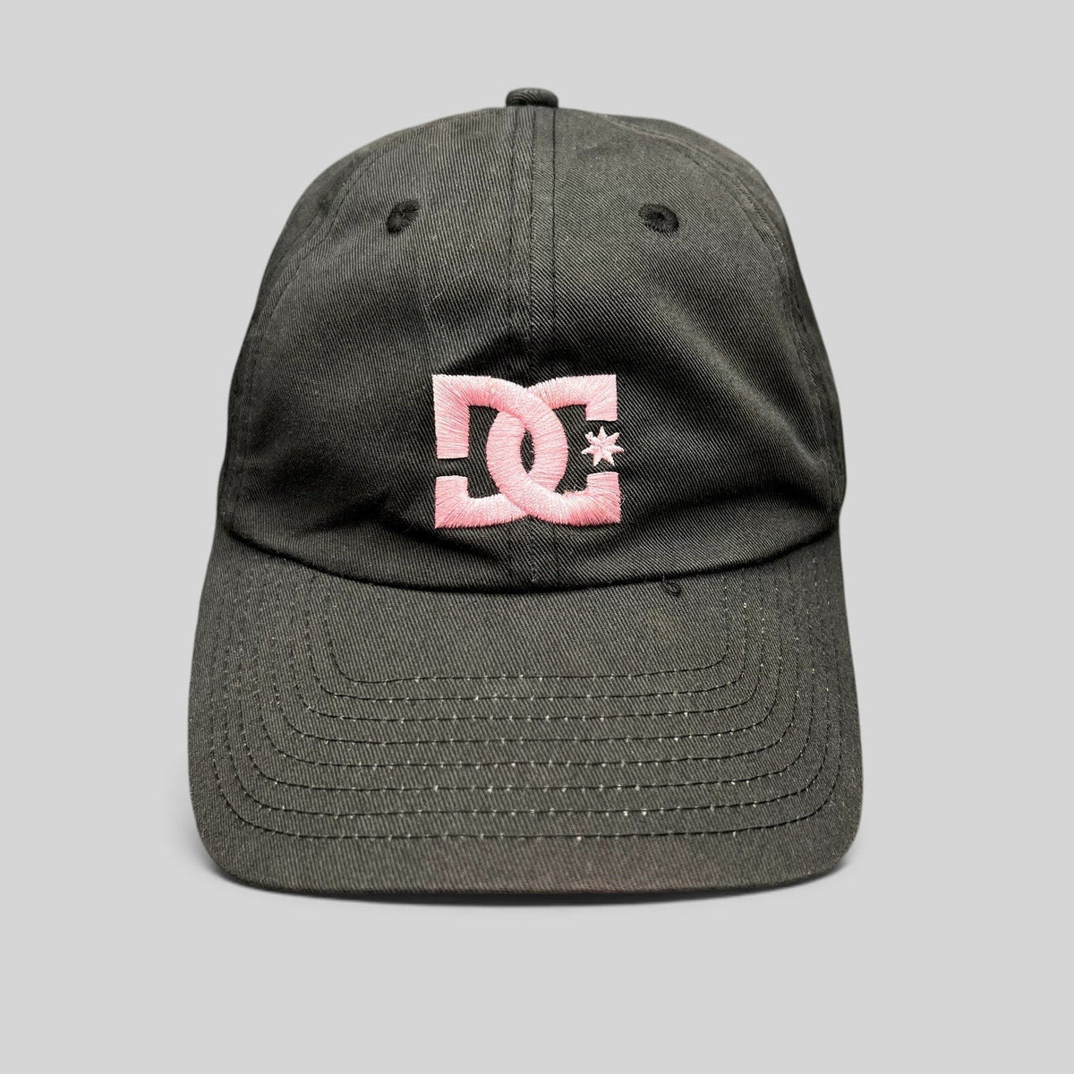 Raree Finds DC Shoes black cotton strapback hat with a pink embroidered logo in a low-profile skate style