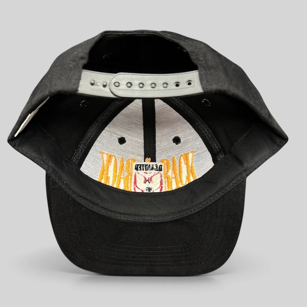 Raree Finds vintage DC United 1996-1997 MLS champions snapback hat, showing the interior crown and adjustable strap.