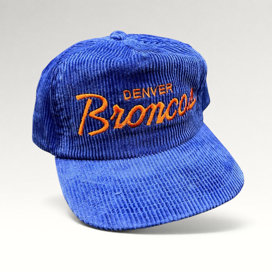 Raree Finds vintage Denver Broncos corduroy hat in royal blue with orange script embroidery and zipback closure