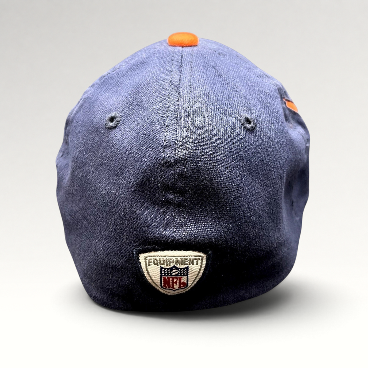 Raree Finds vintage Reebok Denver Broncos NFL Equipment sideline hat in navy with orange button, back view