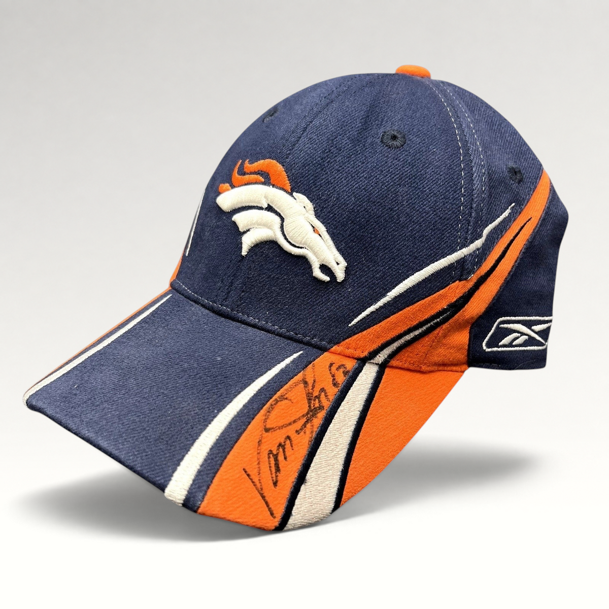 Raree Finds vintage Reebok Denver Broncos sideline hat in navy and orange with Vance Johnson autograph on the brim.