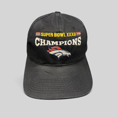 Raree Finds vintage 1998 Denver Broncos Super Bowl XXXII Champions black cotton strapback hat with team embroidery.