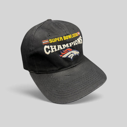 Raree Finds vintage 1998 Denver Broncos Super Bowl XXXII Champions black cotton strapback hat with embroidery.