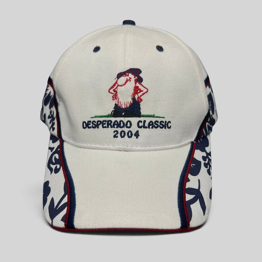 Raree Finds 2004 Desperado Golf Classic white cotton strapback hat with western embroidered logo and patterned panels