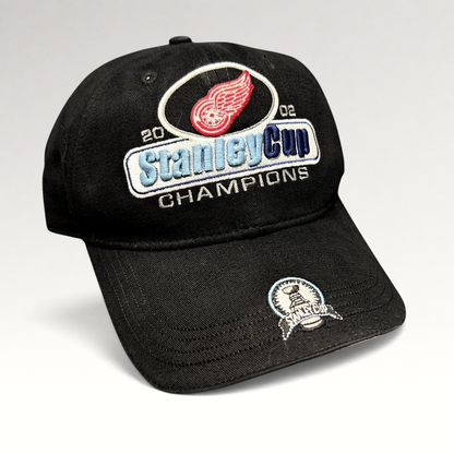 Raree Finds vintage 2002 Detroit Red Wings Stanley Cup Champions black strapback hat with embroidered brim patch
