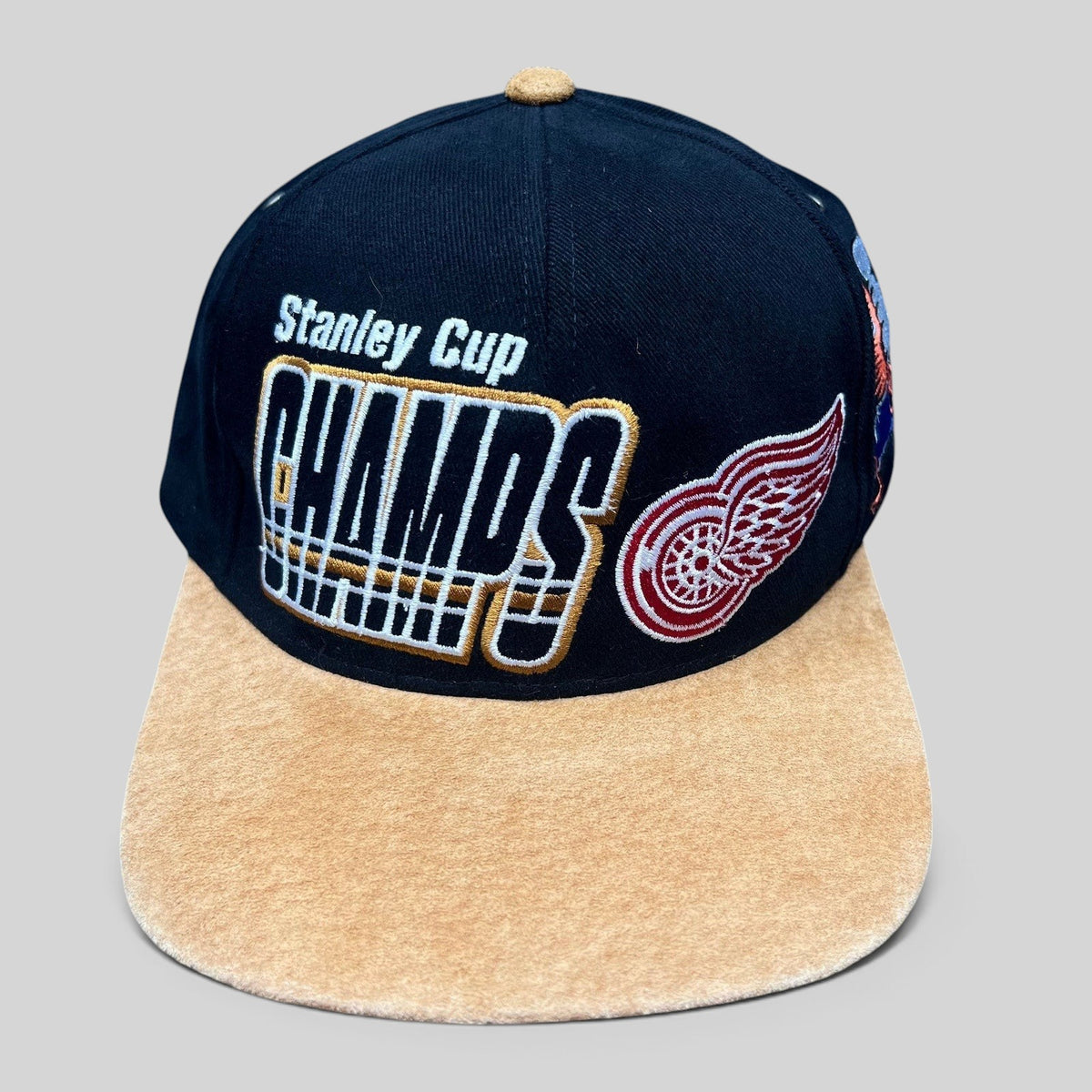 Raree Finds vintage Detroit Red Wings 1997 Stanley Cup Champs Starter snapback hat with black crown and tan suede brim.