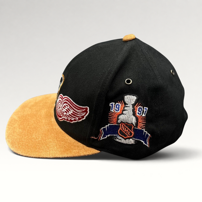 Raree Finds vintage Detroit Red Wings 1997 Stanley Cup Starter snapback hat with black crown and tan suede brim