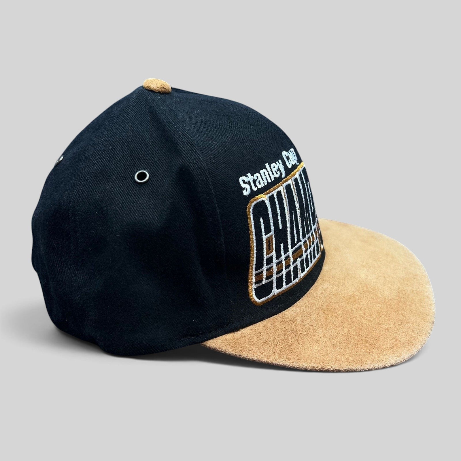 Raree Finds vintage Detroit Red Wings 1997 Stanley Cup Champs Starter snapback hat with black crown and tan suede brim.