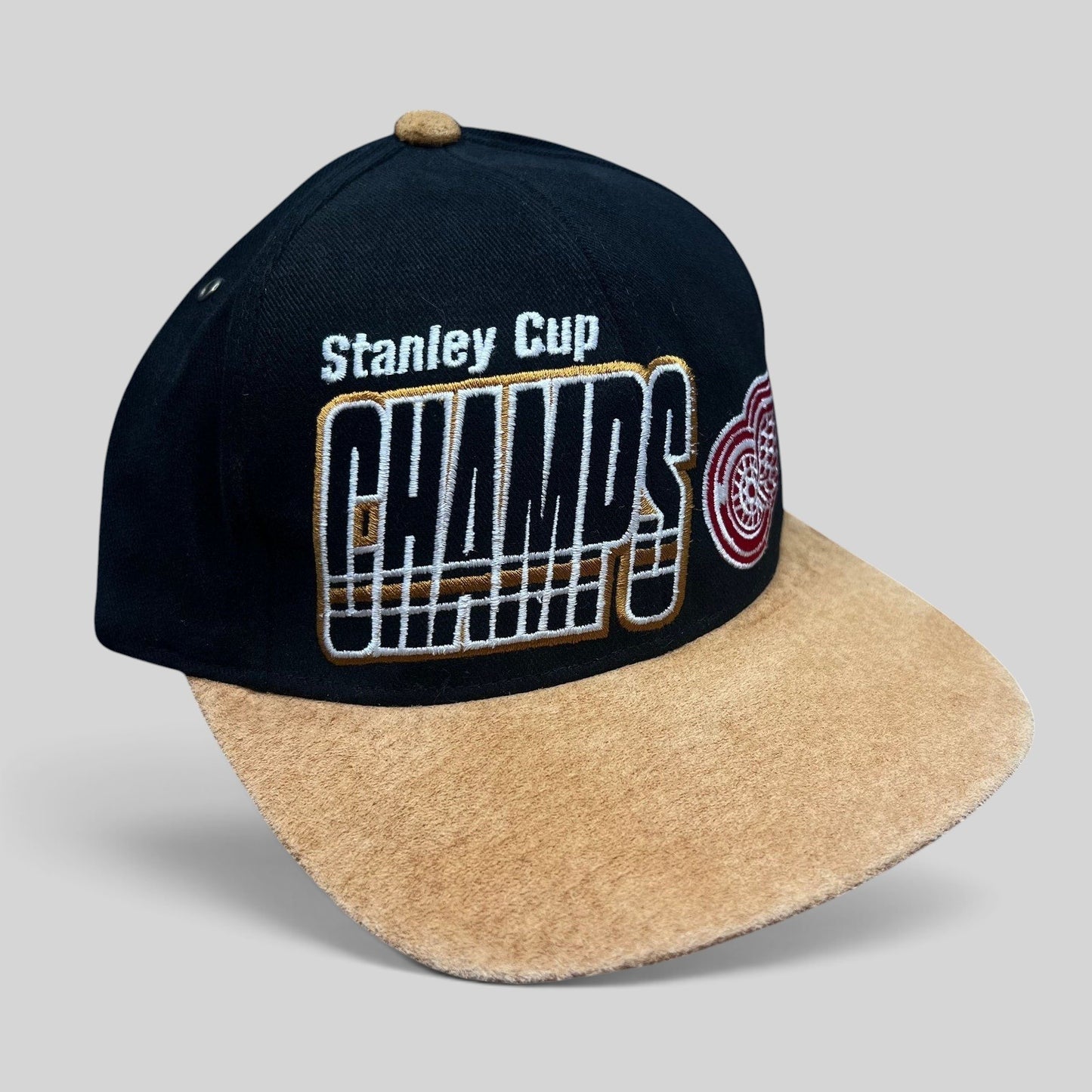 Raree Finds vintage Detroit Red Wings 1997 Stanley Cup Champs Starter snapback hat with black crown and tan suede brim.