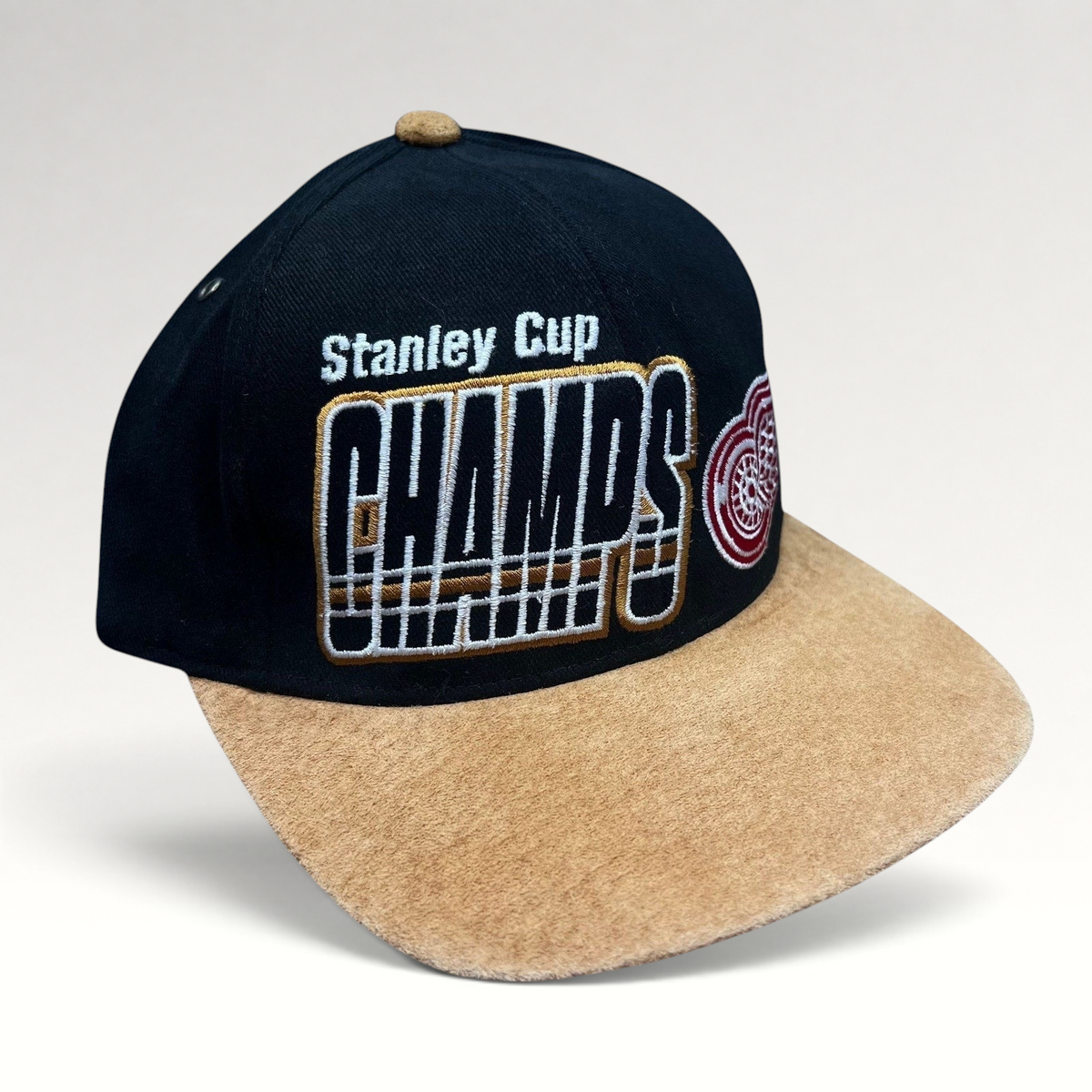 Raree Finds vintage Detroit Red Wings 1997 Stanley Cup Champs Starter snapback hat with black crown and tan suede brim.