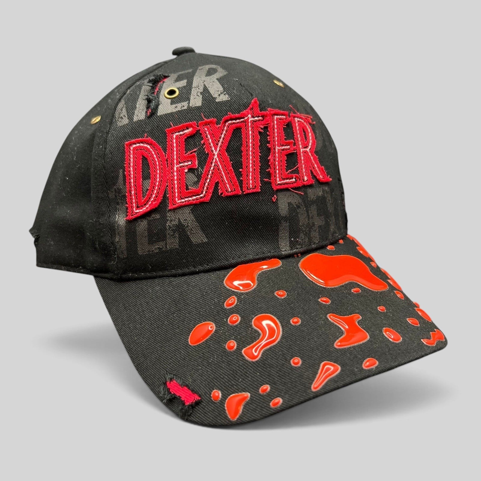 Raree Finds Dexter Showtime cast and crew promo hat in black with red embroidered logo and blood splatter brim detail