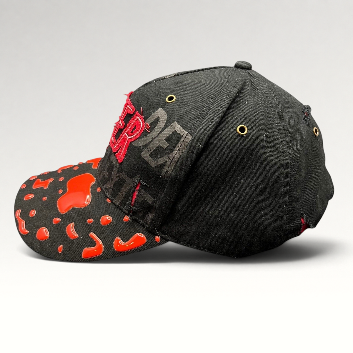Raree Finds Dexter Showtime cast and crew promo hat in black with red blood splatter embroidery and distressed brim.