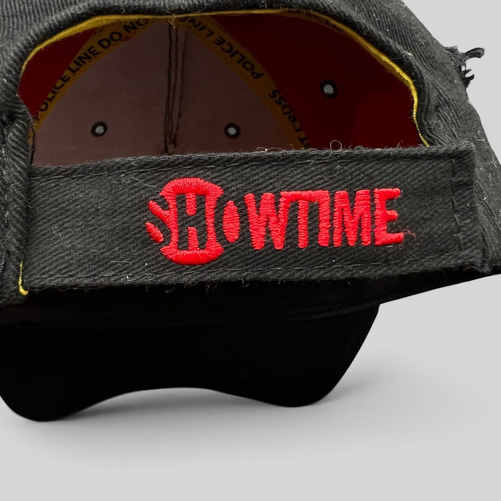 Raree Finds Dexter Showtime promo hat back view featuring red embroidered logo on black strapback closure