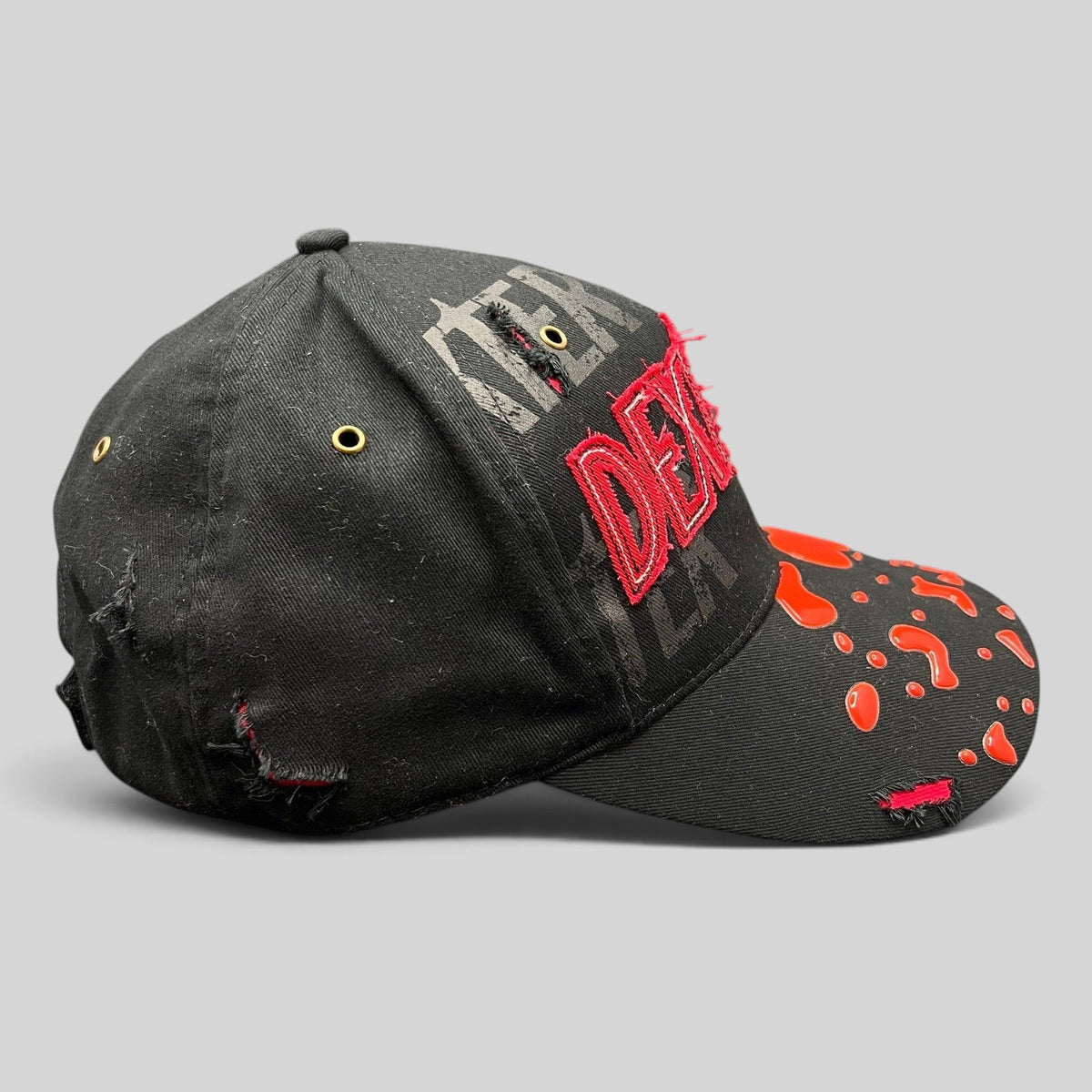 Raree Finds Dexter Showtime cast and crew promo hat in black with red distressed embroidery and blood-splatter brim.