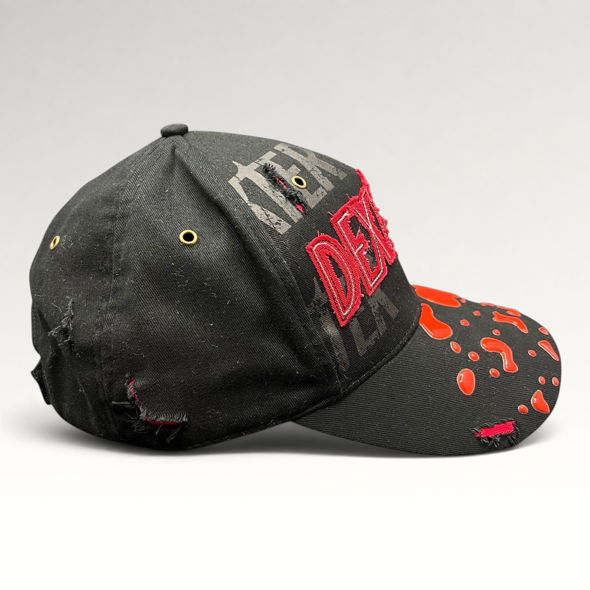 Raree Finds Dexter Showtime cast and crew promo hat in black with red distressed embroidery and blood-splatter brim.