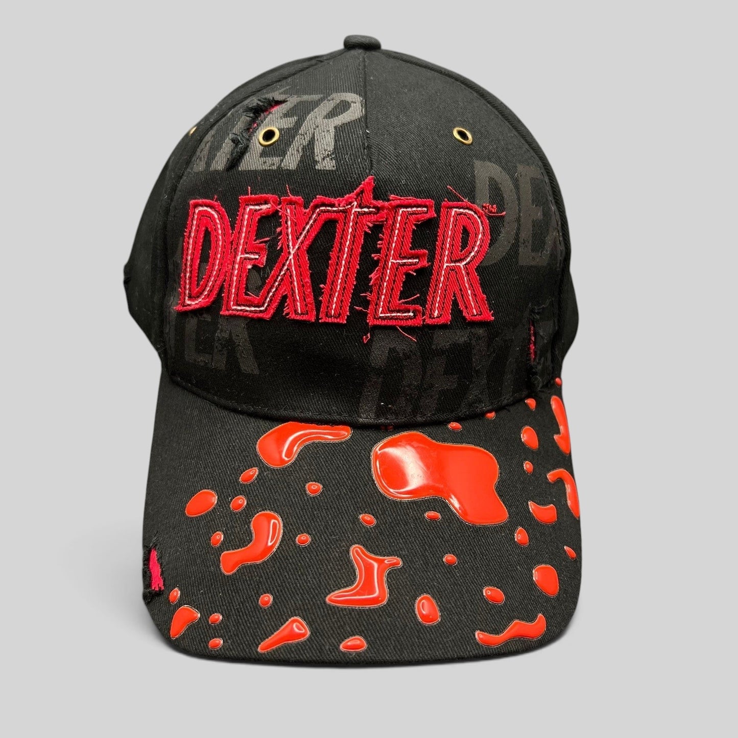 Raree Finds Dexter Showtime cast and crew promo hat in black with red embroidered logo and glossy blood splatter brim