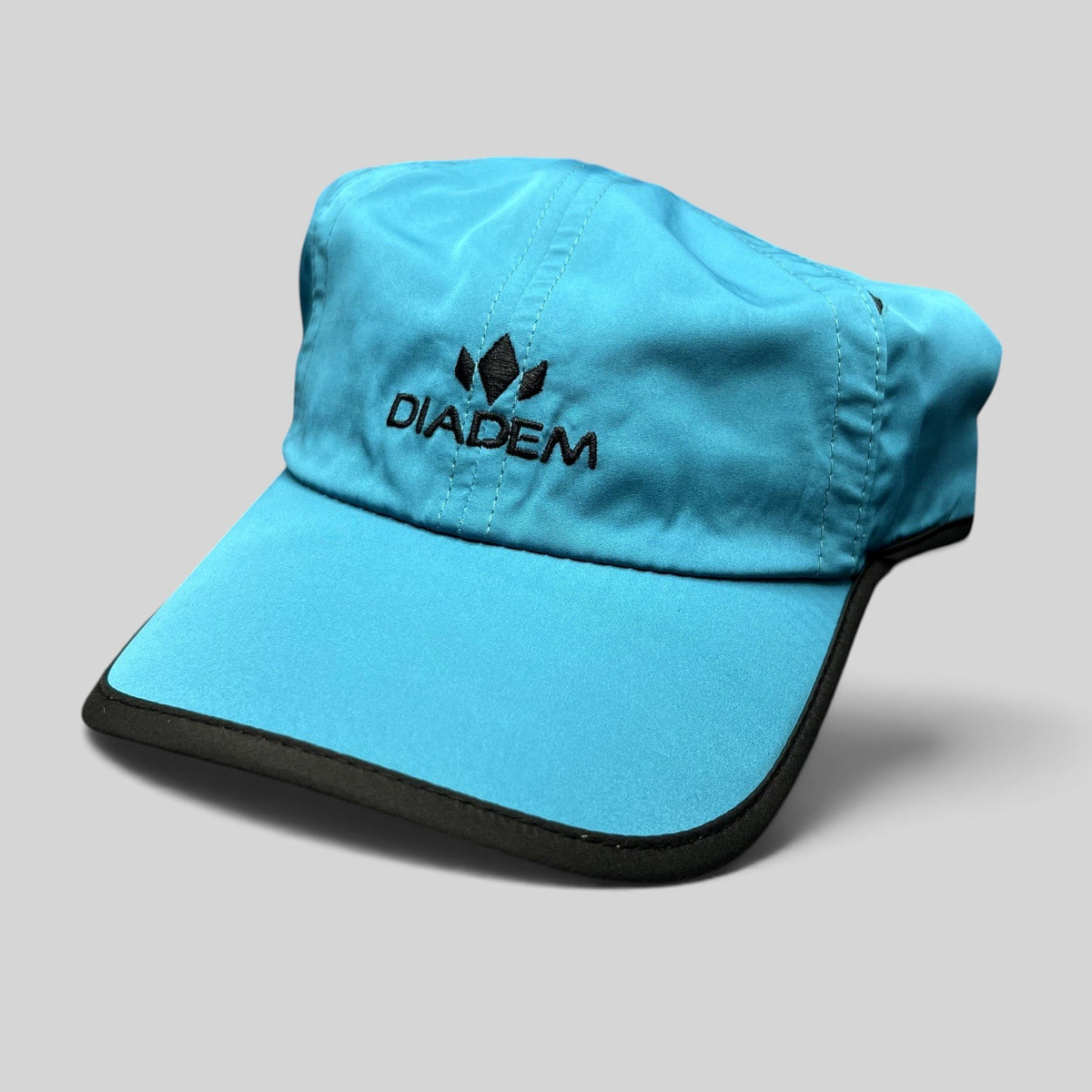 Raree Finds Diadem blue lightweight polyester performance running hat with black brim trim and embroidered logo