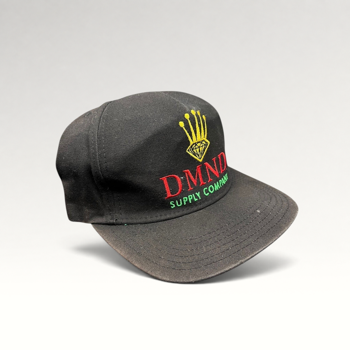 Raree Finds vintage Diamond Supply Co. black snapback hat with red, yellow, and green crown and diamond logo embroidery