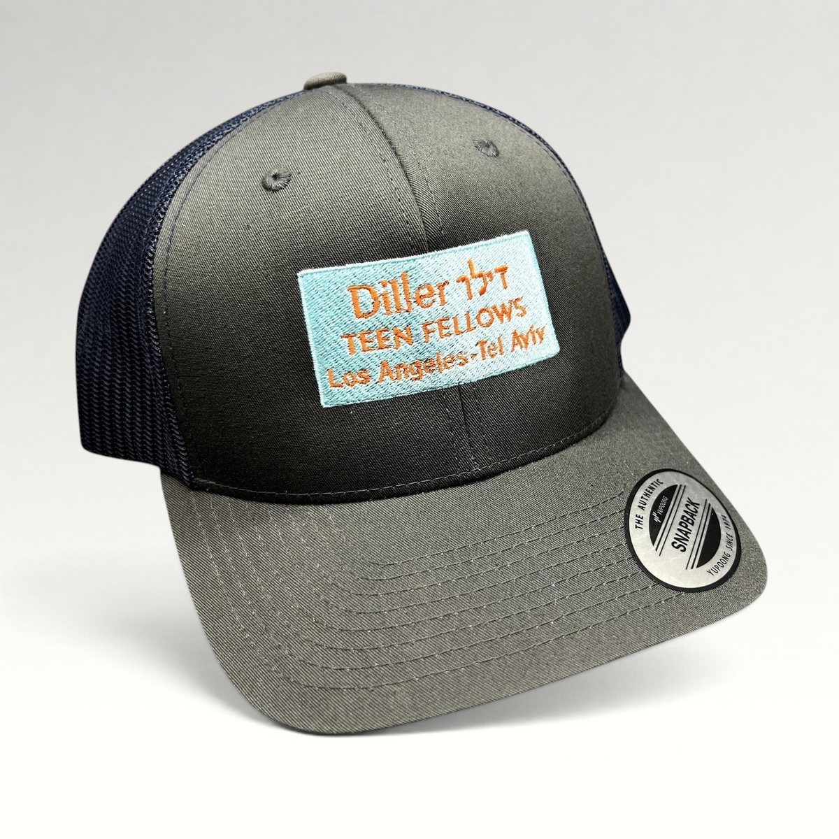 Raree Finds Diller Teen Fellows charcoal and navy Yupoong Classics trucker snapback hat with embroidered patch