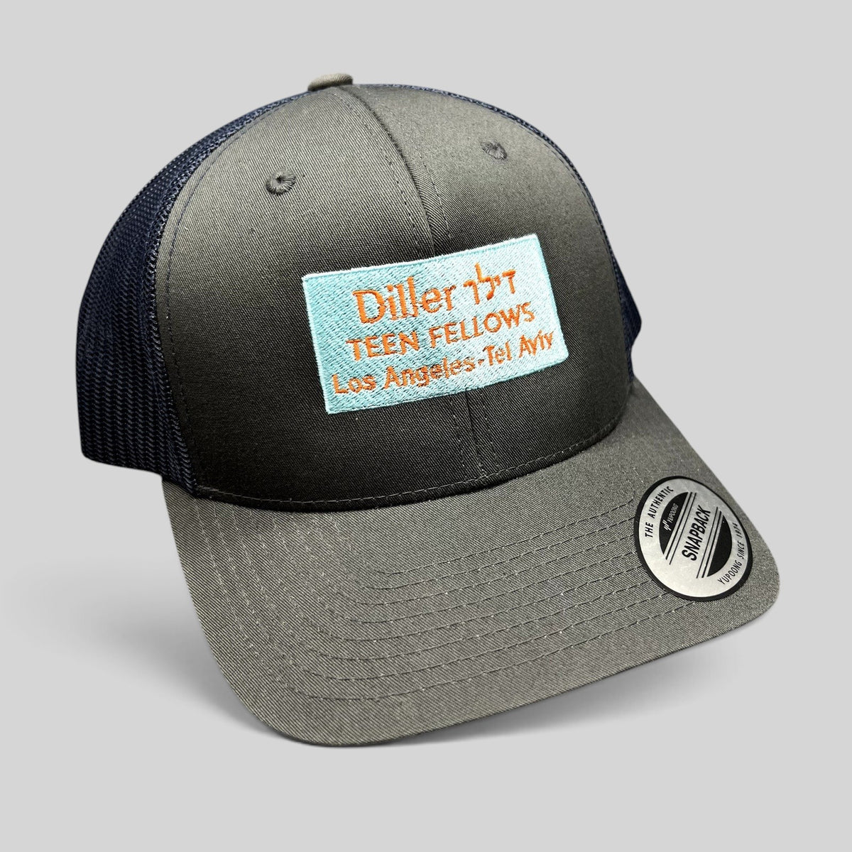 Raree Finds Diller Teen Fellows charcoal and navy Yupoong Classics snapback trucker hat with embroidered patch