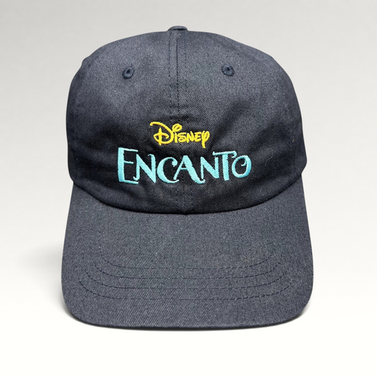 Raree Finds navy blue cotton dad hat with embroidered Disney Encanto logo in gold and teal on the front